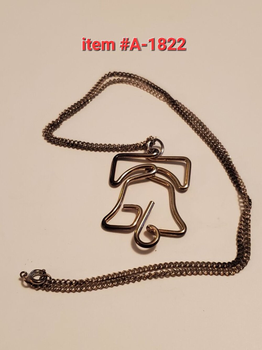 1 Silver Liberty Bell Necklace, item # A -1822, wt  23grams.